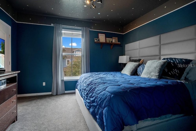 bedroom featuring light colored carpet