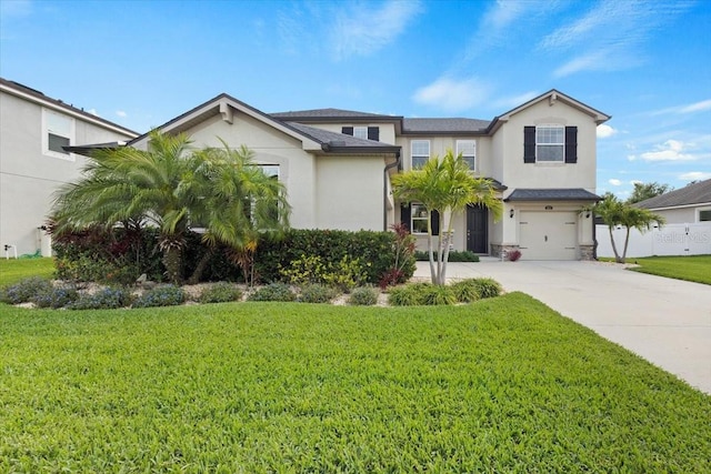 view of front facade featuring a front lawn and a garage