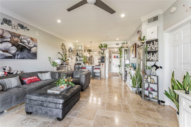 living room with ceiling fan and ornamental molding