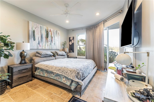 bedroom featuring ceiling fan and access to outside