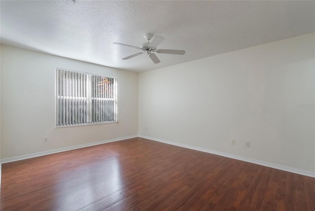 empty room with wood-type flooring, a textured ceiling, and ceiling fan