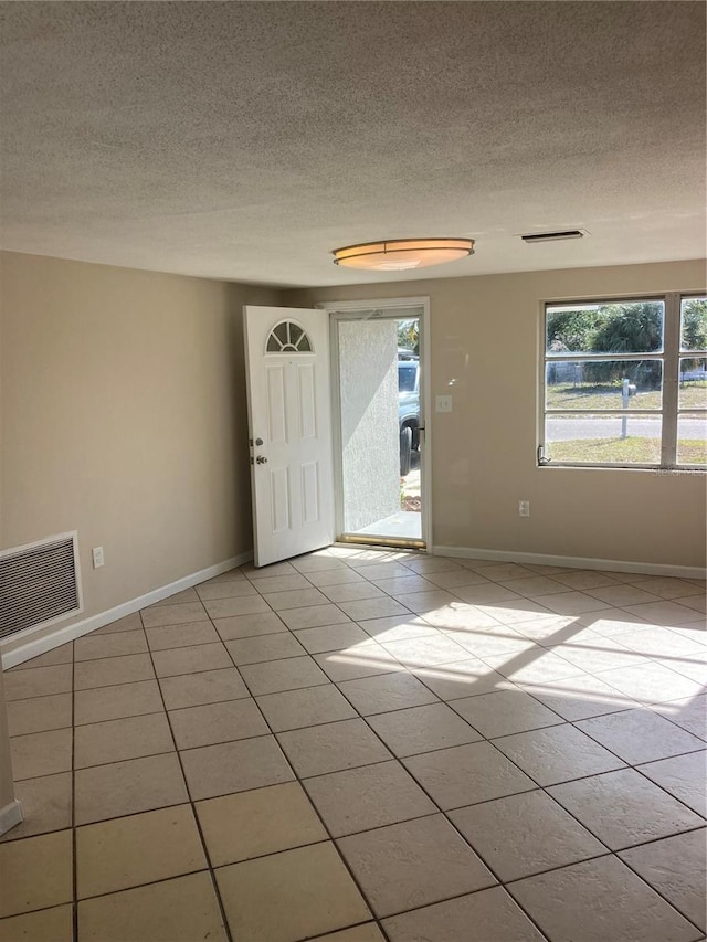 view of tiled empty room