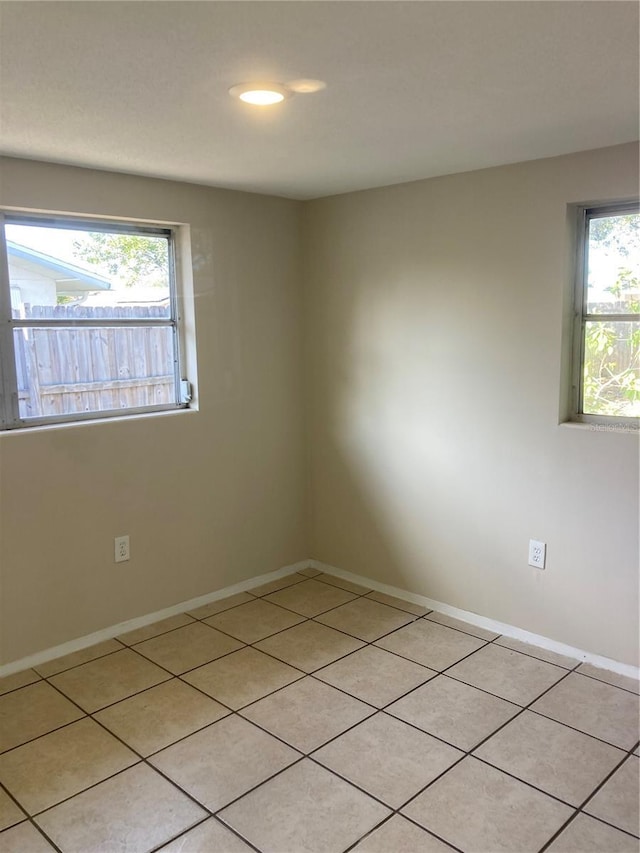 view of tiled empty room