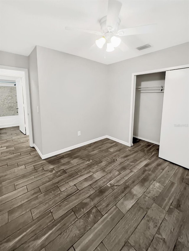 unfurnished bedroom featuring a closet and ceiling fan