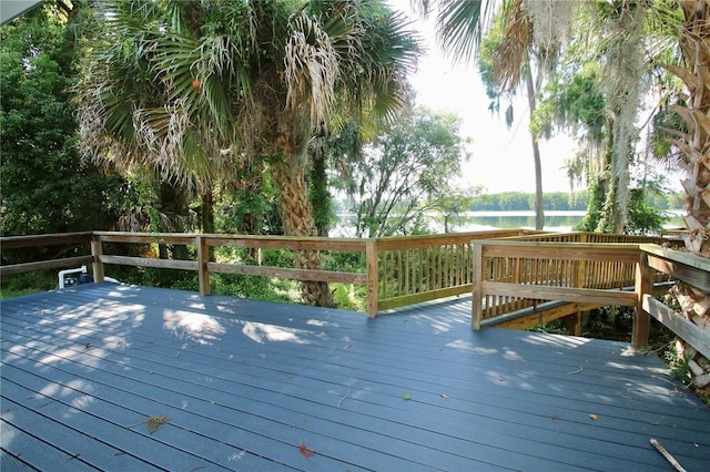 wooden terrace with a water view