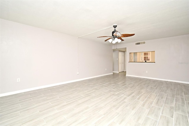 unfurnished room featuring ceiling fan