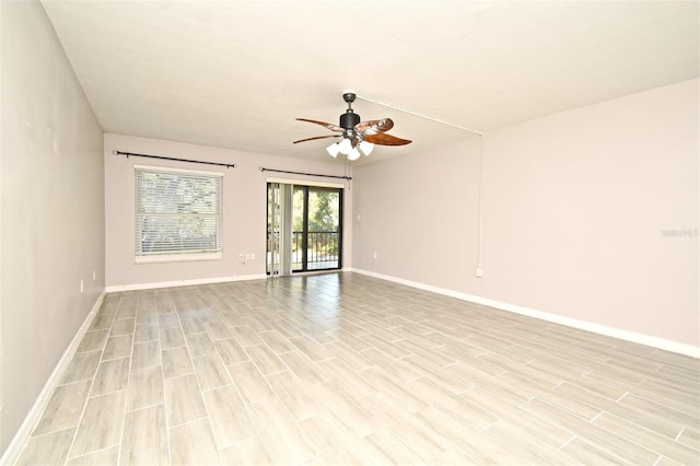 spare room with ceiling fan and light hardwood / wood-style floors