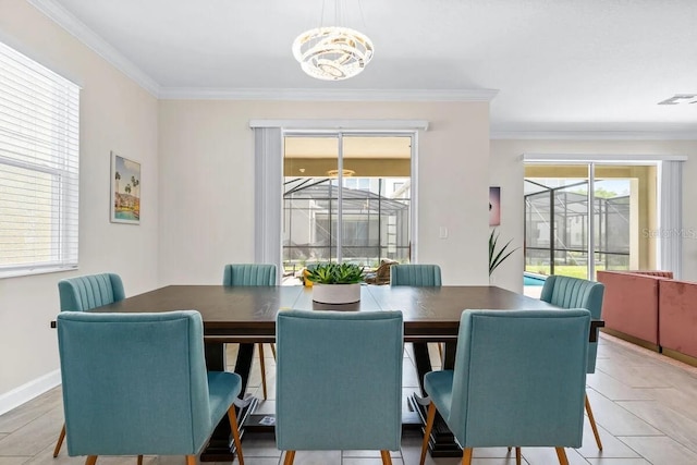 dining area featuring a notable chandelier and crown molding