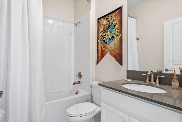 full bathroom with shower / tub combo, vanity, and toilet