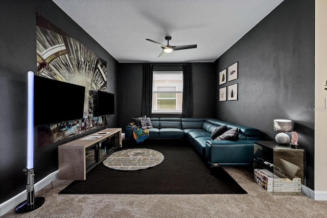 carpeted living room with a textured ceiling and ceiling fan