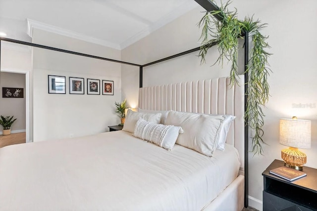 bedroom featuring crown molding