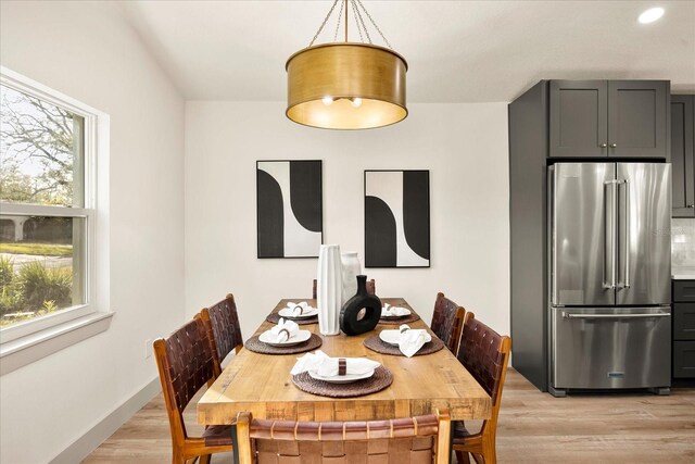 dining area featuring light wood-style floors, recessed lighting, and baseboards