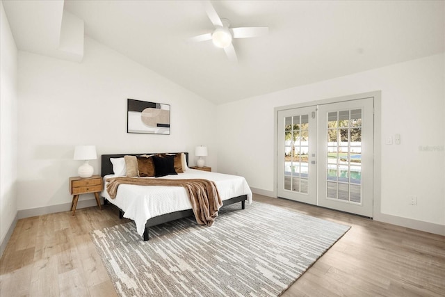 bedroom with access to exterior, light wood-style floors, lofted ceiling, baseboards, and a ceiling fan