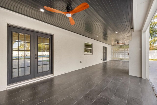 view of patio / terrace featuring french doors and a ceiling fan