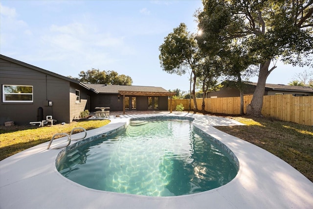 view of swimming pool with a patio