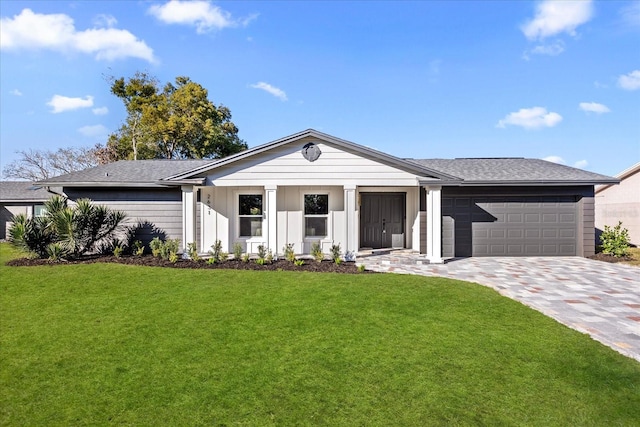 single story home featuring decorative driveway, a garage, a front lawn, and roof with shingles