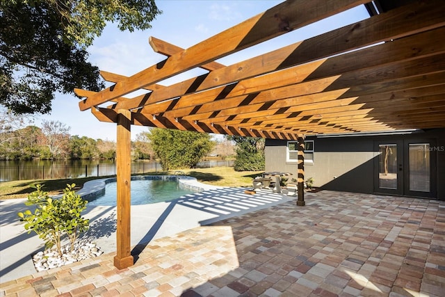 view of pool with a pergola, a fenced backyard, french doors, a fenced in pool, and a water view