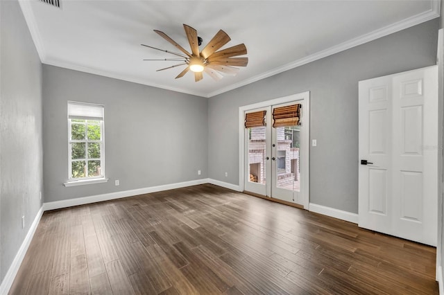 empty room with french doors, dark wood-type flooring, ceiling fan, and ornamental molding