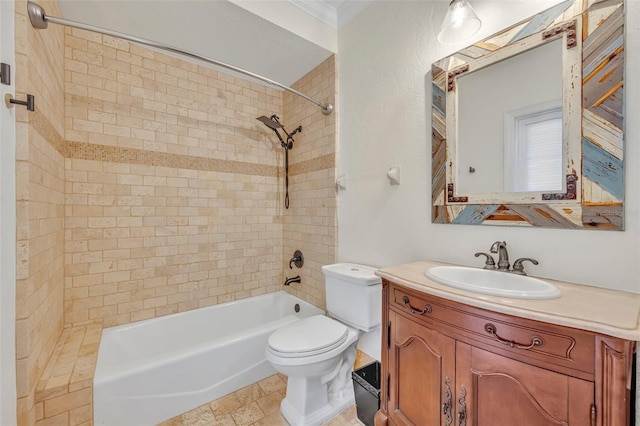 full bathroom featuring vanity, toilet, and tiled shower / bath combo