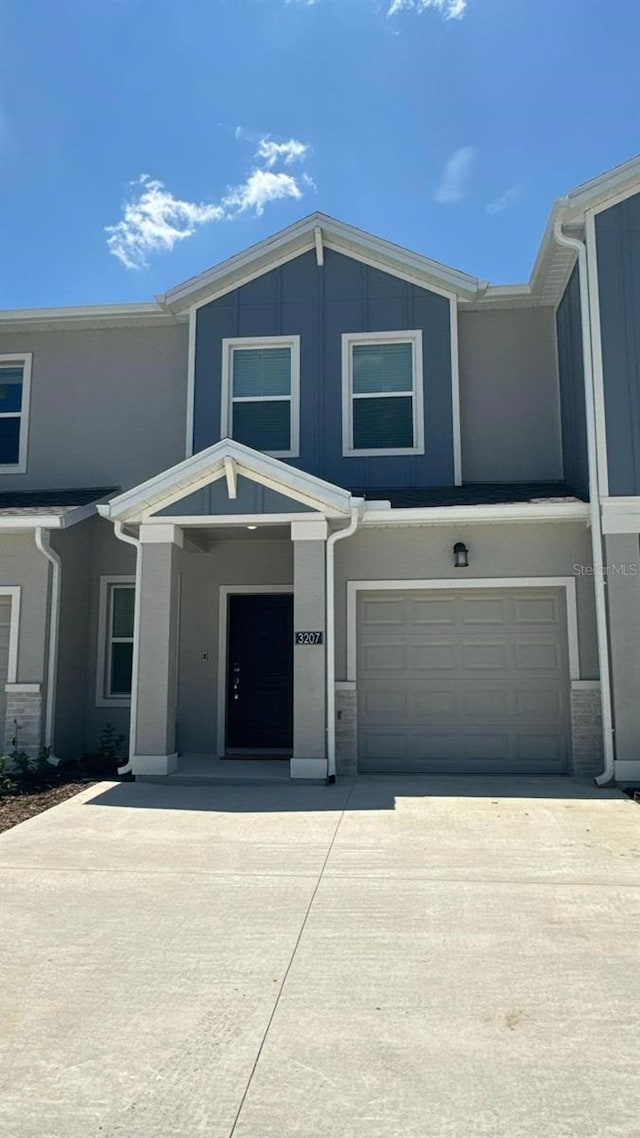 view of front of property with a garage