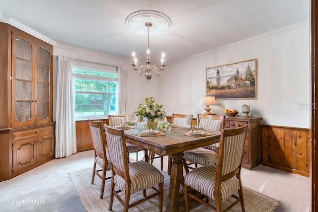 carpeted dining space featuring a notable chandelier, crown molding, and wooden walls