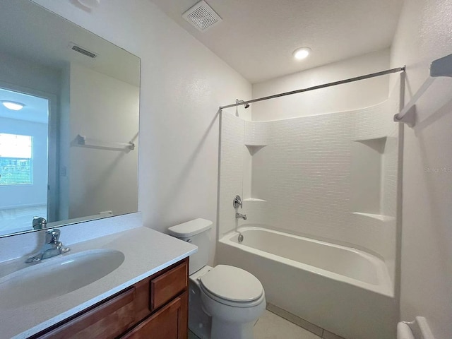 full bathroom featuring tile patterned floors, shower / bathing tub combination, vanity, and toilet