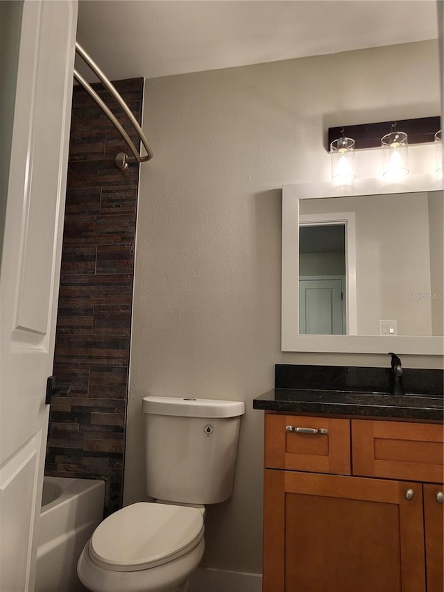 full bathroom featuring vanity, toilet, and shower / washtub combination