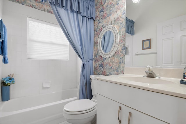 bathroom featuring toilet, shower / bathtub combination with curtain, and vanity