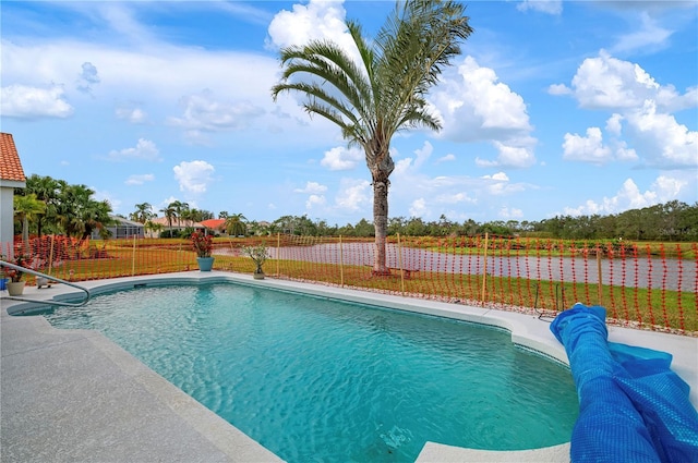 view of pool with fence and a fenced in pool