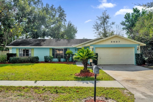 single story home featuring a front yard and a garage