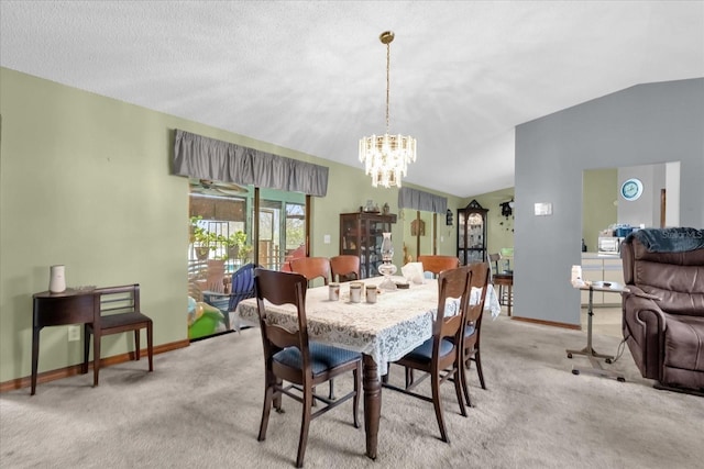 carpeted dining area with lofted ceiling and a notable chandelier