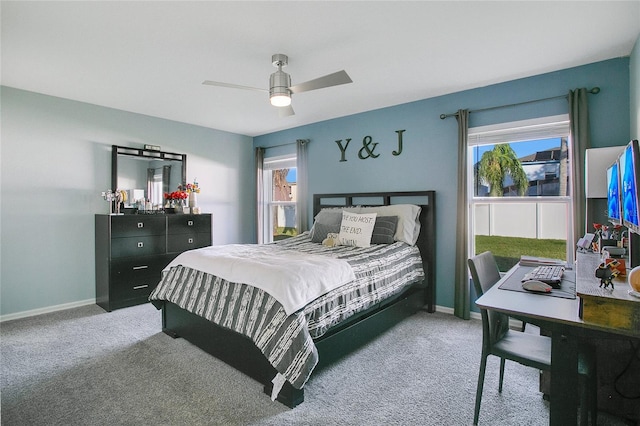 bedroom with ceiling fan and carpet floors