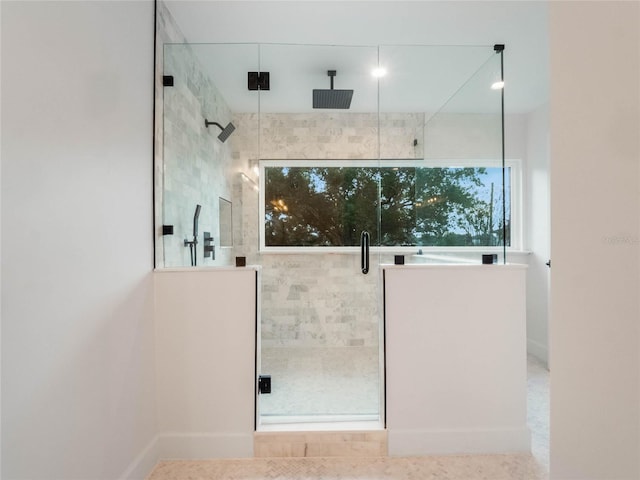 bathroom featuring an enclosed shower