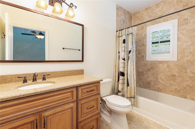 full bathroom with ceiling fan, tile patterned flooring, toilet, vanity, and shower / tub combo