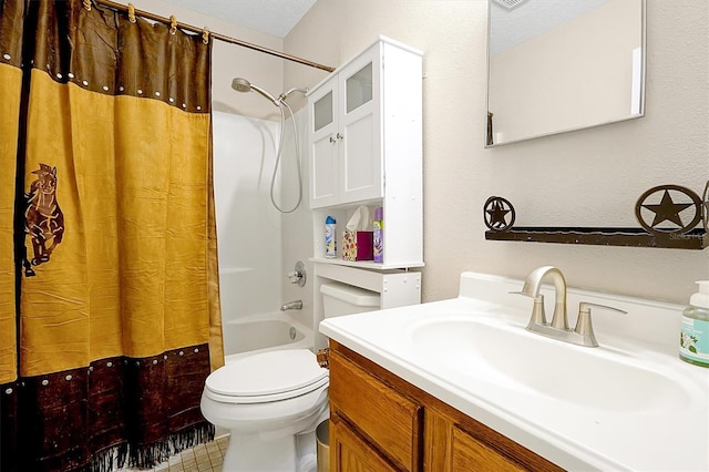 full bathroom with a textured ceiling, vanity, toilet, and shower / bath combo with shower curtain