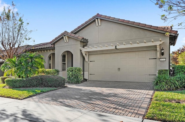 view of front of home with a garage