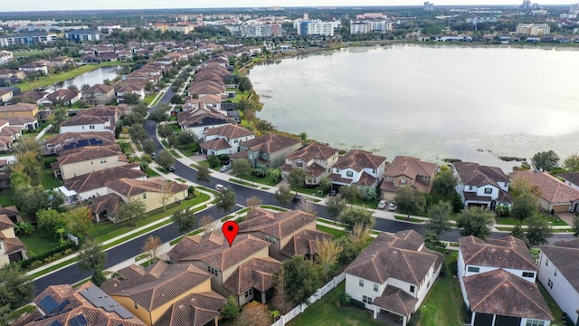 drone / aerial view with a water view