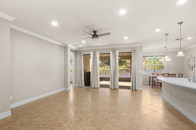 unfurnished living room with ceiling fan, light tile patterned flooring, and ornamental molding