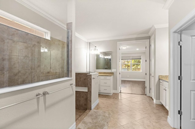 bathroom with vanity, tile patterned floors, and ornamental molding