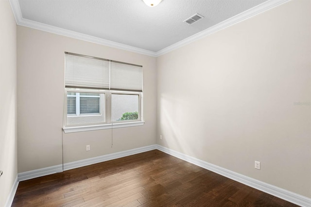 unfurnished room with hardwood / wood-style flooring, crown molding, and a textured ceiling