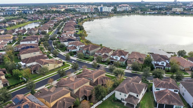 bird's eye view with a water view