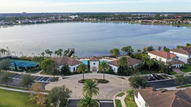 birds eye view of property featuring a water view