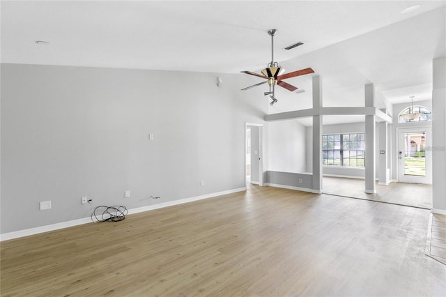 unfurnished living room with ceiling fan, high vaulted ceiling, and hardwood / wood-style flooring