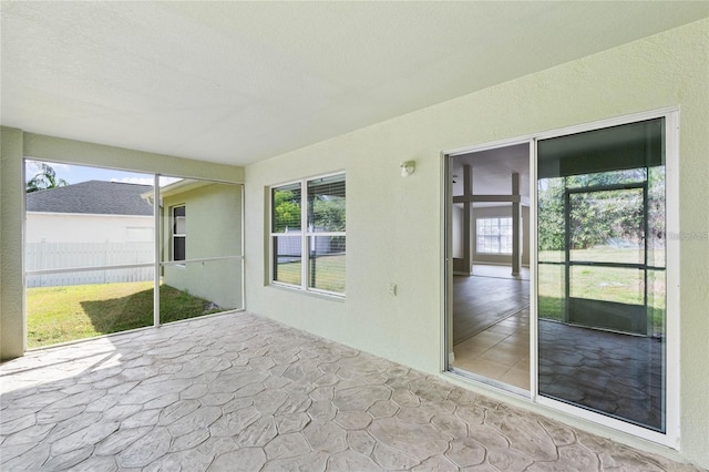 view of unfurnished sunroom