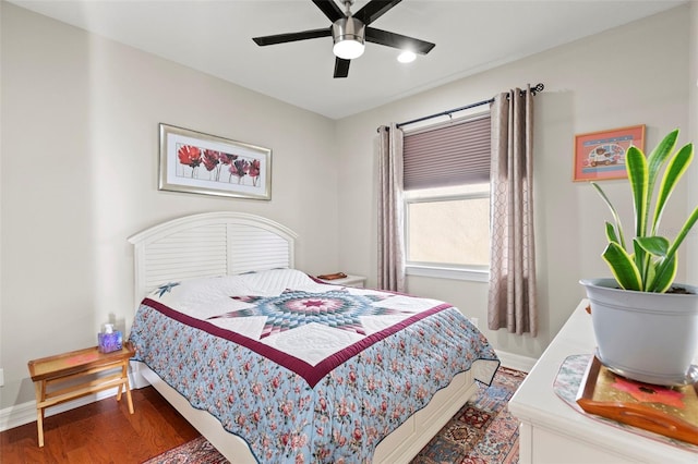 bedroom with hardwood / wood-style flooring and ceiling fan