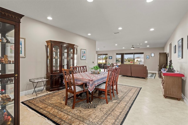 dining room featuring ceiling fan