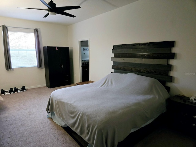 bedroom with light carpet and ceiling fan