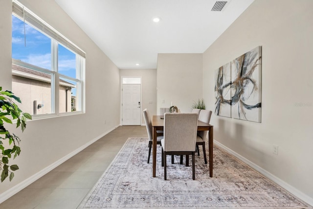 dining room featuring light tile patterned floors