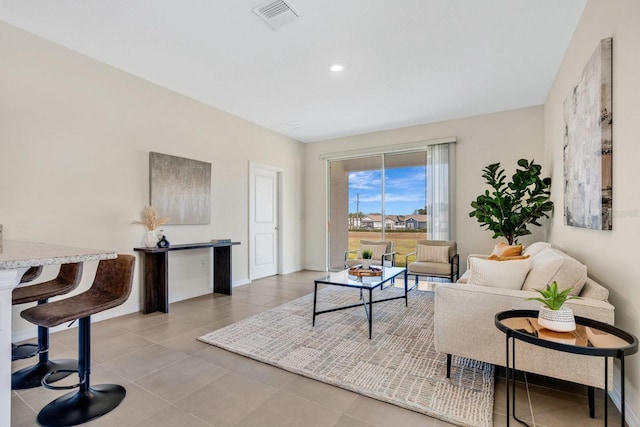 living room featuring light tile patterned floors