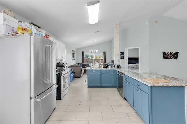 kitchen featuring lofted ceiling, blue cabinets, appliances with stainless steel finishes, a notable chandelier, and kitchen peninsula